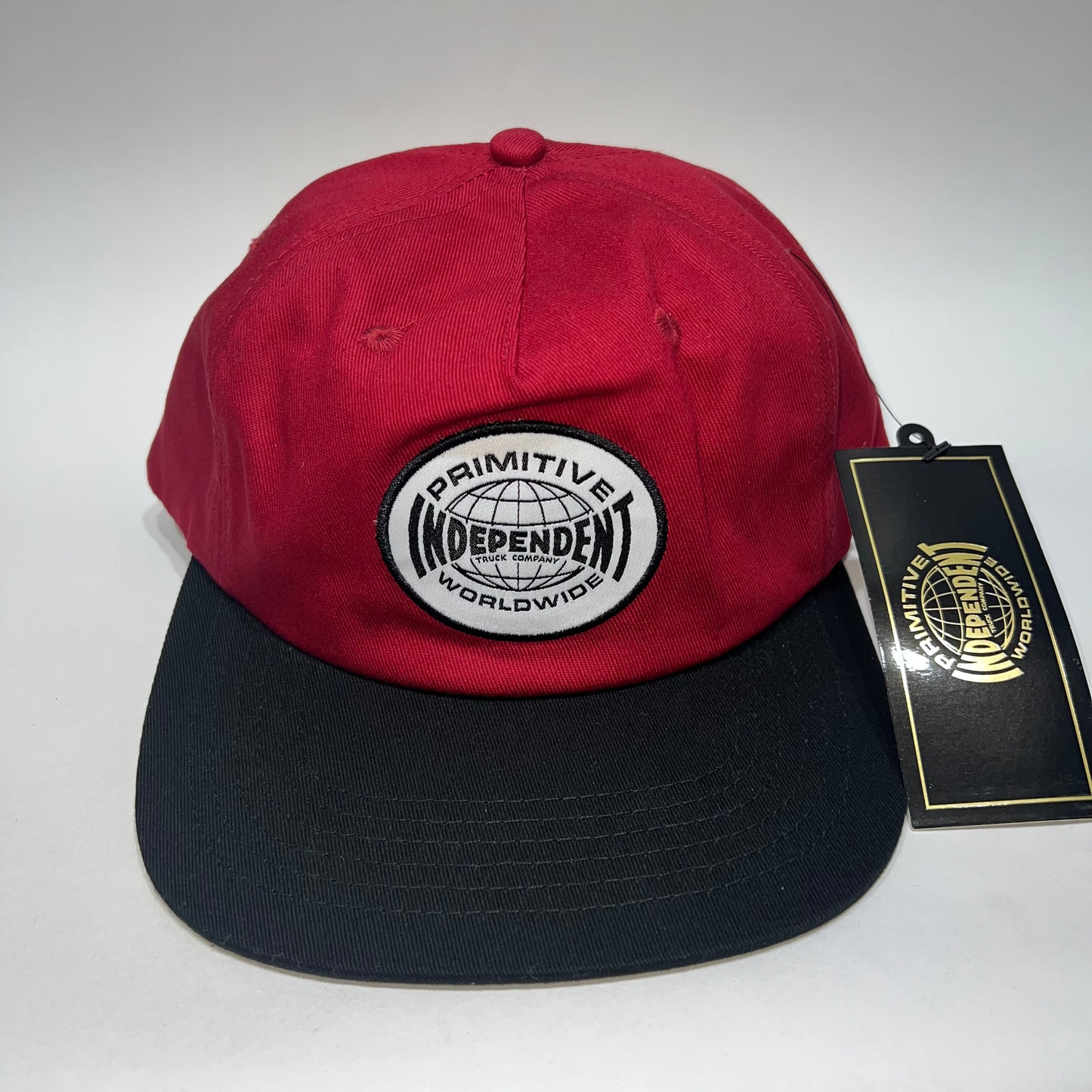 Gorra Primitive x Independent Global roja